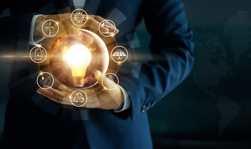 Businessman,Holding,Light,Bulb,With,Energy,Sources,Icon.,Campaigning,For